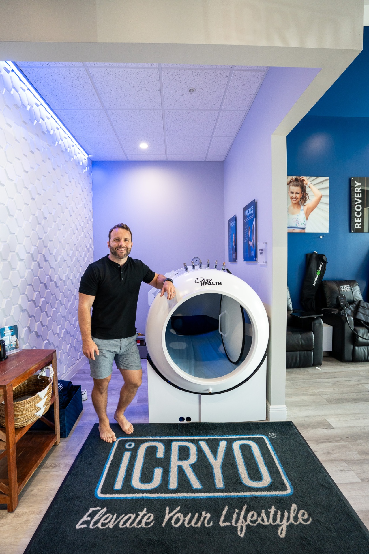 Owner beside the OxyHealth Fortius 420 hyperbaric chamber